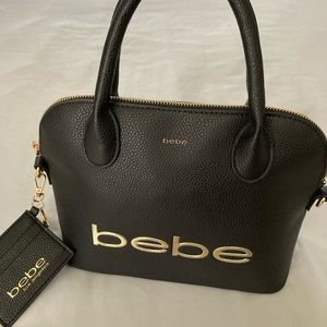 Black small every day bag with a strap